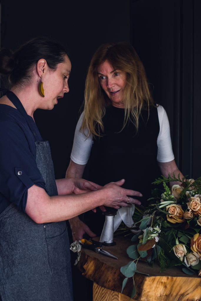 floral-mentorship woman teaching a floral design mentorship
