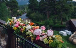 citrus wedding flowers at the landings estes park colorado