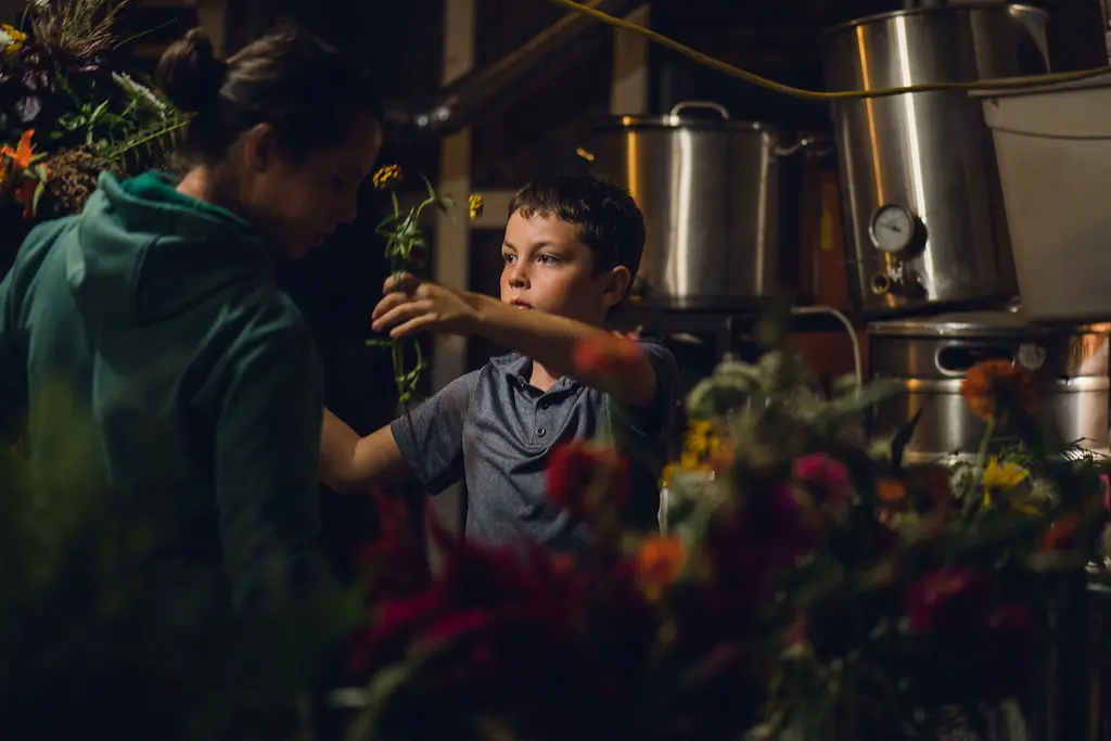 Floral designer Elycia Feldman creating a bridal bouquet with son in New York while photographer Melody Stevenson captures the process.