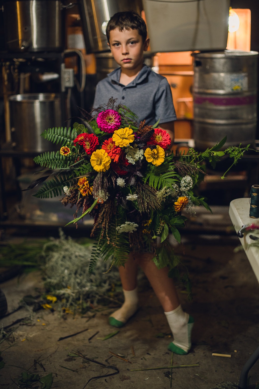 Quentin with garden style bridal bouquet Big magic, Melody photographs Elycia's son with bridal bouquet in upstate New York