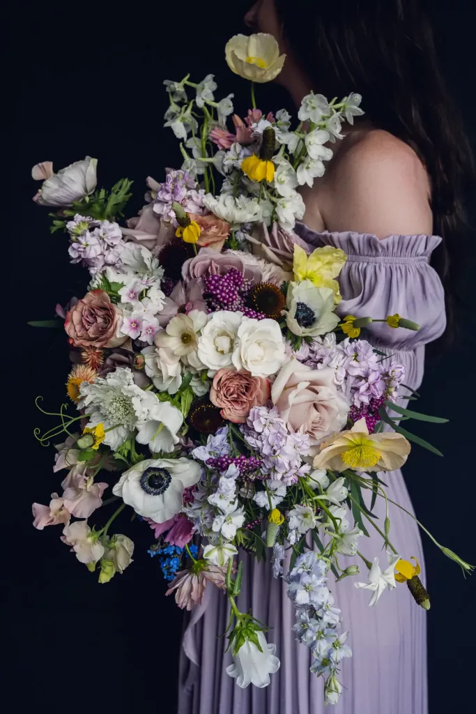 wild-blossoms-vera-christian-the-landing-estes-park-wedding-web-15 Pastel bridal bouquet made with lots of flower varieties and textures.