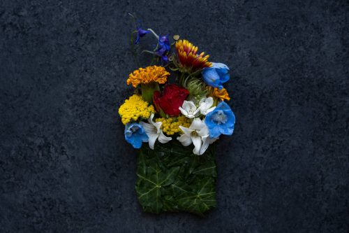 groom's floral pocket square of vibrant flowers for colorado wedding